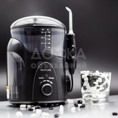 Ирригатор Revyline RL 500 Black с дезинфекцией насадок и гидромассажем десен