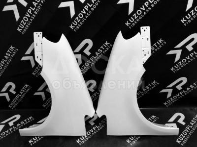 Крыло на Volkswagen Touran из стеклопластика.