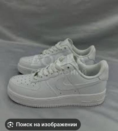 Продаю кроссовки фирмы-Nake(кожа)в идеальном состоянии Б/У