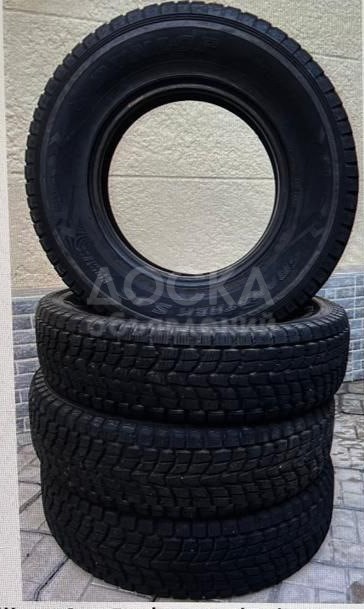 Продаются  4 шины  Зим. Dunlop 215/80, r16 (комплект)
